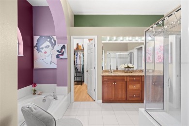 Welcome to this stunning 4-bedroom, 3-bath home featuring a on East Lake Woodlands Country Club in Florida - for sale on GolfHomes.com, golf home, golf lot