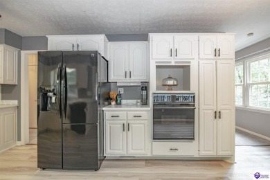 Discover this beautifully refreshed 4-bedroom home, set on a on Doe Valley Country Club in Kentucky - for sale on GolfHomes.com, golf home, golf lot