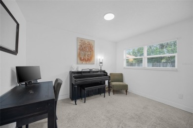 You don't want to miss this stunning, updated corner lot home in on Mangrove Bay Golf Course in Florida - for sale on GolfHomes.com, golf home, golf lot