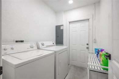 You don't want to miss this stunning, updated corner lot home in on Mangrove Bay Golf Course in Florida - for sale on GolfHomes.com, golf home, golf lot