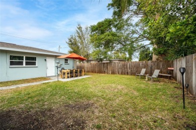 You don't want to miss this stunning, updated corner lot home in on Mangrove Bay Golf Course in Florida - for sale on GolfHomes.com, golf home, golf lot