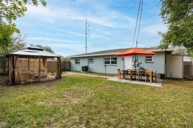 You don't want to miss this stunning, updated corner lot home in on Mangrove Bay Golf Course in Florida - for sale on GolfHomes.com, golf home, golf lot