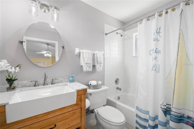 Welcome to this stunning 4-bedroom, 3-bath home featuring a on East Lake Woodlands Country Club in Florida - for sale on GolfHomes.com, golf home, golf lot