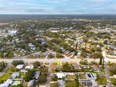 You don't want to miss this stunning, updated corner lot home in on Mangrove Bay Golf Course in Florida - for sale on GolfHomes.com, golf home, golf lot