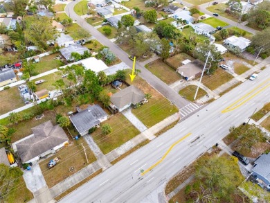 You don't want to miss this stunning, updated corner lot home in on Mangrove Bay Golf Course in Florida - for sale on GolfHomes.com, golf home, golf lot