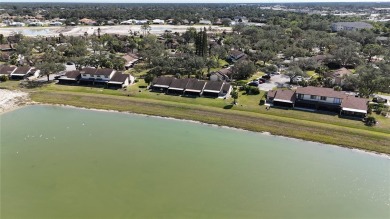 Welcome home to your lovely 2 bedroom, 2 bathroom END UNIT on Sabal Trace Golf and Country Club in Florida - for sale on GolfHomes.com, golf home, golf lot