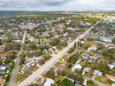You don't want to miss this stunning, updated corner lot home in on Mangrove Bay Golf Course in Florida - for sale on GolfHomes.com, golf home, golf lot
