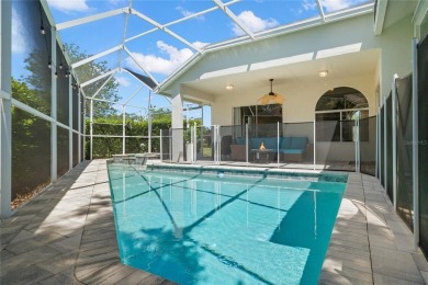 Welcome to this stunning 4-bedroom, 3-bath home featuring a on East Lake Woodlands Country Club in Florida - for sale on GolfHomes.com, golf home, golf lot