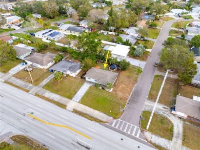 You don't want to miss this stunning, updated corner lot home in on Mangrove Bay Golf Course in Florida - for sale on GolfHomes.com, golf home, golf lot