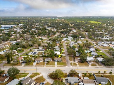 You don't want to miss this stunning, updated corner lot home in on Mangrove Bay Golf Course in Florida - for sale on GolfHomes.com, golf home, golf lot
