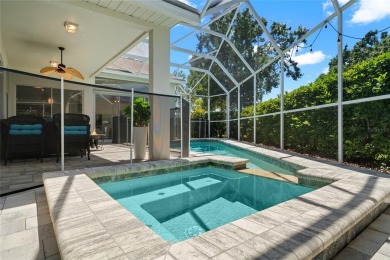 Welcome to this stunning 4-bedroom, 3-bath home featuring a on East Lake Woodlands Country Club in Florida - for sale on GolfHomes.com, golf home, golf lot