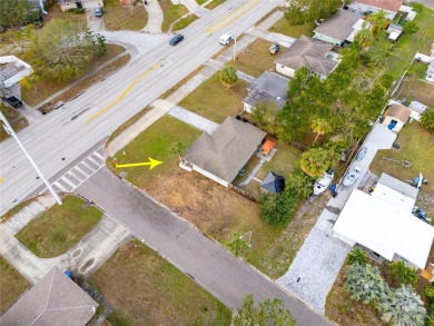 You don't want to miss this stunning, updated corner lot home in on Mangrove Bay Golf Course in Florida - for sale on GolfHomes.com, golf home, golf lot