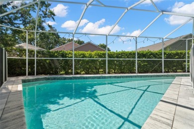 Welcome to this stunning 4-bedroom, 3-bath home featuring a on East Lake Woodlands Country Club in Florida - for sale on GolfHomes.com, golf home, golf lot