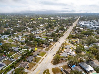 You don't want to miss this stunning, updated corner lot home in on Mangrove Bay Golf Course in Florida - for sale on GolfHomes.com, golf home, golf lot