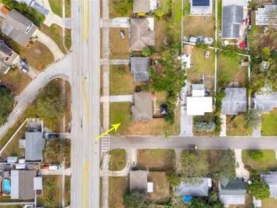 You don't want to miss this stunning, updated corner lot home in on Mangrove Bay Golf Course in Florida - for sale on GolfHomes.com, golf home, golf lot