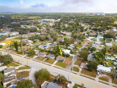 You don't want to miss this stunning, updated corner lot home in on Mangrove Bay Golf Course in Florida - for sale on GolfHomes.com, golf home, golf lot