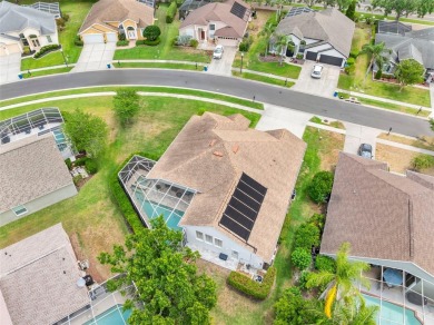 Welcome to this stunning 4-bedroom, 3-bath home featuring a on East Lake Woodlands Country Club in Florida - for sale on GolfHomes.com, golf home, golf lot