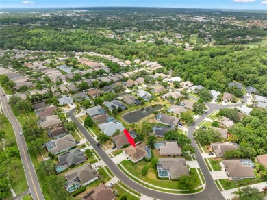 Welcome to this stunning 4-bedroom, 3-bath home featuring a on East Lake Woodlands Country Club in Florida - for sale on GolfHomes.com, golf home, golf lot