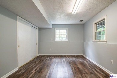 Discover this beautifully refreshed 4-bedroom home, set on a on Doe Valley Country Club in Kentucky - for sale on GolfHomes.com, golf home, golf lot