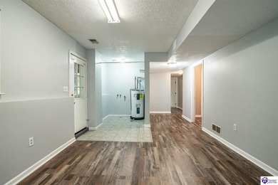 Discover this beautifully refreshed 4-bedroom home, set on a on Doe Valley Country Club in Kentucky - for sale on GolfHomes.com, golf home, golf lot