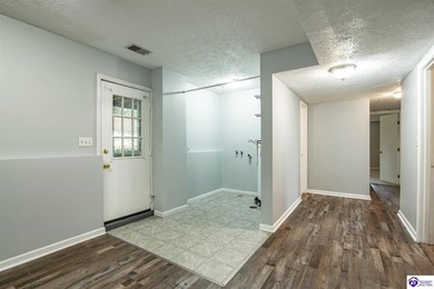 Discover this beautifully refreshed 4-bedroom home, set on a on Doe Valley Country Club in Kentucky - for sale on GolfHomes.com, golf home, golf lot