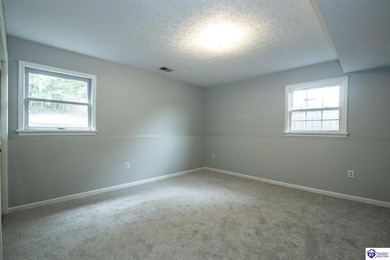 Discover this beautifully refreshed 4-bedroom home, set on a on Doe Valley Country Club in Kentucky - for sale on GolfHomes.com, golf home, golf lot