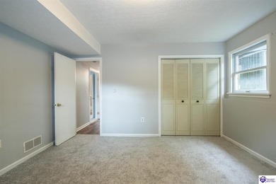 Discover this beautifully refreshed 4-bedroom home, set on a on Doe Valley Country Club in Kentucky - for sale on GolfHomes.com, golf home, golf lot