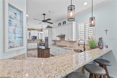 Maintenance-Free Patio Home with Lake View in St. Andrews East on Plantation Golf and Country Club in Florida - for sale on GolfHomes.com, golf home, golf lot