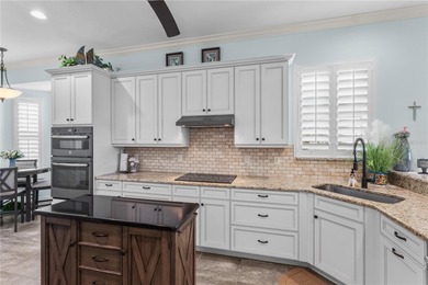 Maintenance-Free Patio Home with Lake View in St. Andrews East on Plantation Golf and Country Club in Florida - for sale on GolfHomes.com, golf home, golf lot