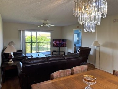 INVESTORS' DREAM - NO RENTAL WAITING PERIOD! Spacious 2BR/2BA, 1 on Flamingo Lakes Country Club in Florida - for sale on GolfHomes.com, golf home, golf lot