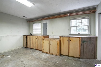 Discover this beautifully refreshed 4-bedroom home, set on a on Doe Valley Country Club in Kentucky - for sale on GolfHomes.com, golf home, golf lot