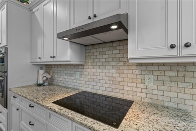 Maintenance-Free Patio Home with Lake View in St. Andrews East on Plantation Golf and Country Club in Florida - for sale on GolfHomes.com, golf home, golf lot