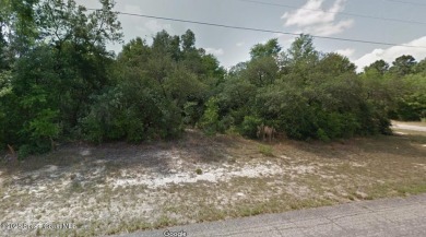 This is a big lot with 0.37 Acres. Wooded Residential lot in a on Citrus Springs Country Club in Florida - for sale on GolfHomes.com, golf home, golf lot
