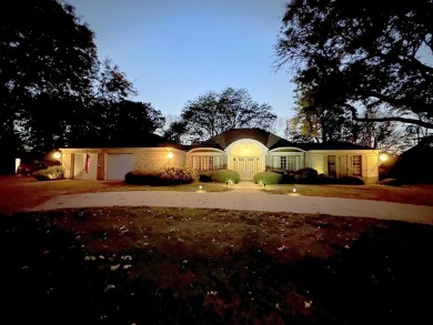 Elegant Brick Ranch Home situated on the Number Six Fairway of on Spencer Golf and Country Club in Iowa - for sale on GolfHomes.com, golf home, golf lot