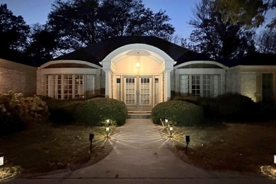 Elegant Brick Ranch Home situated on the Number Six Fairway of on Spencer Golf and Country Club in Iowa - for sale on GolfHomes.com, golf home, golf lot