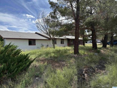 Here's an investment opportunity that could really turn out well on Silver City Golf Course in New Mexico - for sale on GolfHomes.com, golf home, golf lot