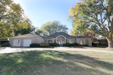 Elegant Brick Ranch Home situated on the Number Six Fairway of on Spencer Golf and Country Club in Iowa - for sale on GolfHomes.com, golf home, golf lot