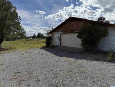 Here's an investment opportunity that could really turn out well on Silver City Golf Course in New Mexico - for sale on GolfHomes.com, golf home, golf lot