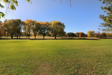 Elegant Brick Ranch Home situated on the Number Six Fairway of on Spencer Golf and Country Club in Iowa - for sale on GolfHomes.com, golf home, golf lot