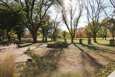 Elegant Brick Ranch Home situated on the Number Six Fairway of on Spencer Golf and Country Club in Iowa - for sale on GolfHomes.com, golf home, golf lot