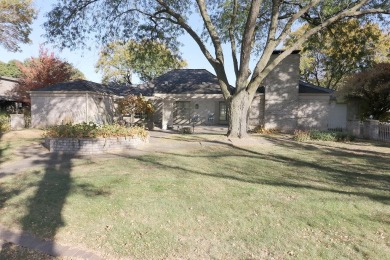 Elegant Brick Ranch Home situated on the Number Six Fairway of on Spencer Golf and Country Club in Iowa - for sale on GolfHomes.com, golf home, golf lot