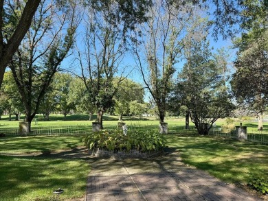 Elegant Brick Ranch Home situated on the Number Six Fairway of on Spencer Golf and Country Club in Iowa - for sale on GolfHomes.com, golf home, golf lot