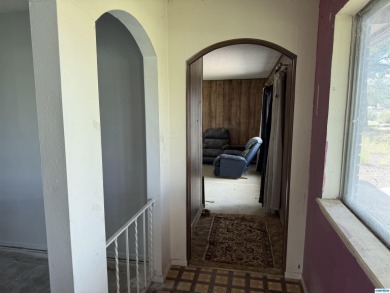 Here's an investment opportunity that could really turn out well on Silver City Golf Course in New Mexico - for sale on GolfHomes.com, golf home, golf lot