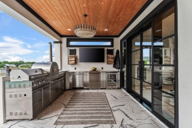This dream home is nestled within the gated waterfront community on Legends Golf Course in Texas - for sale on GolfHomes.com, golf home, golf lot