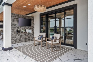 This dream home is nestled within the gated waterfront community on Legends Golf Course in Texas - for sale on GolfHomes.com, golf home, golf lot