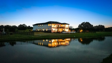 This dream home is nestled within the gated waterfront community on Legends Golf Course in Texas - for sale on GolfHomes.com, golf home, golf lot