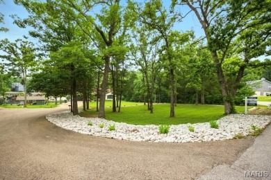 WOW -- Rare Lakefront Opportunity on a Private Cul-de-sac on 1/2 on Raintree Country Club in Missouri - for sale on GolfHomes.com, golf home, golf lot
