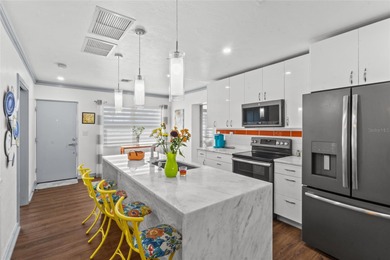 Looking for a great home with a Mother-In-Law Suite, or want to on Sorrento Par 3 in Florida - for sale on GolfHomes.com, golf home, golf lot