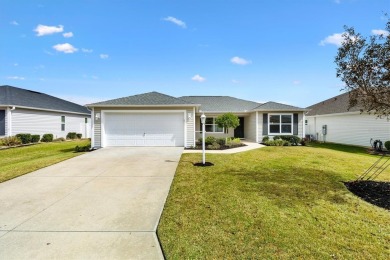 Welcome to this meticulously maintained 3-bedroom, 2-bathroom on Bella Glade Country Club - Lake County in Florida - for sale on GolfHomes.com, golf home, golf lot