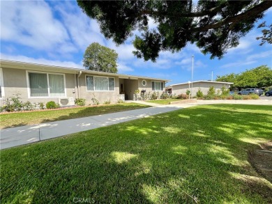 Expanded corner unit on a beautiful greenbelt!  This fully on Leisure World Seal Beach Golf Course in California - for sale on GolfHomes.com, golf home, golf lot